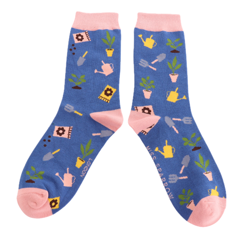A pair of socks with an allotment motif. Blue legs, pink heel toe and cuff.