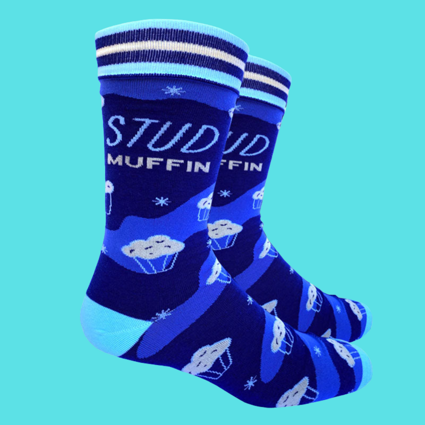 A pair of socks with a stud muffin slogan. Blue legs, light blue heel, toe and cuff.
