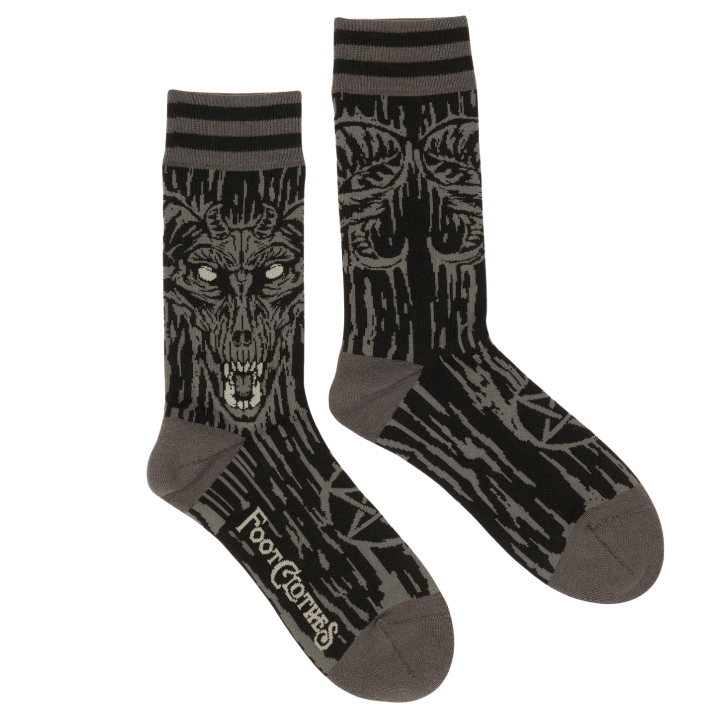 A pair of socks depicting a gruesome demon from the deep. Brown toes, heel and cuff.