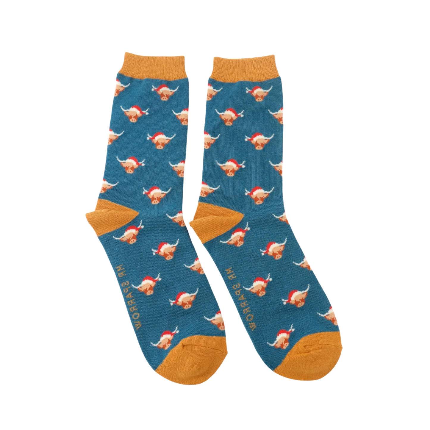 A pair of socks with a festive highland cow pattern. Light blue legs, orange heel, toe and cuff.