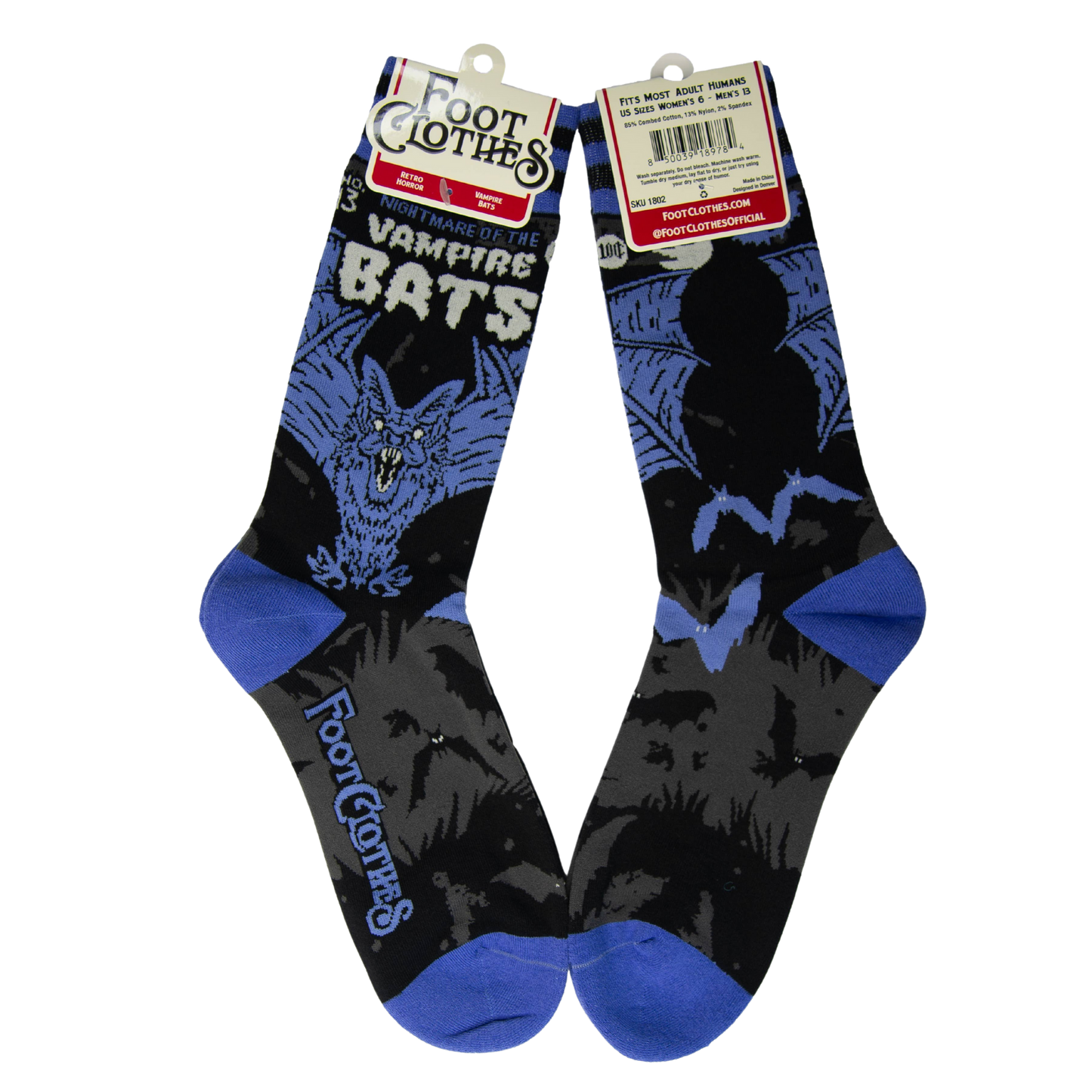 A pair of socks depicting a scary looking vampire bat. Blue toes, cuff and heel.