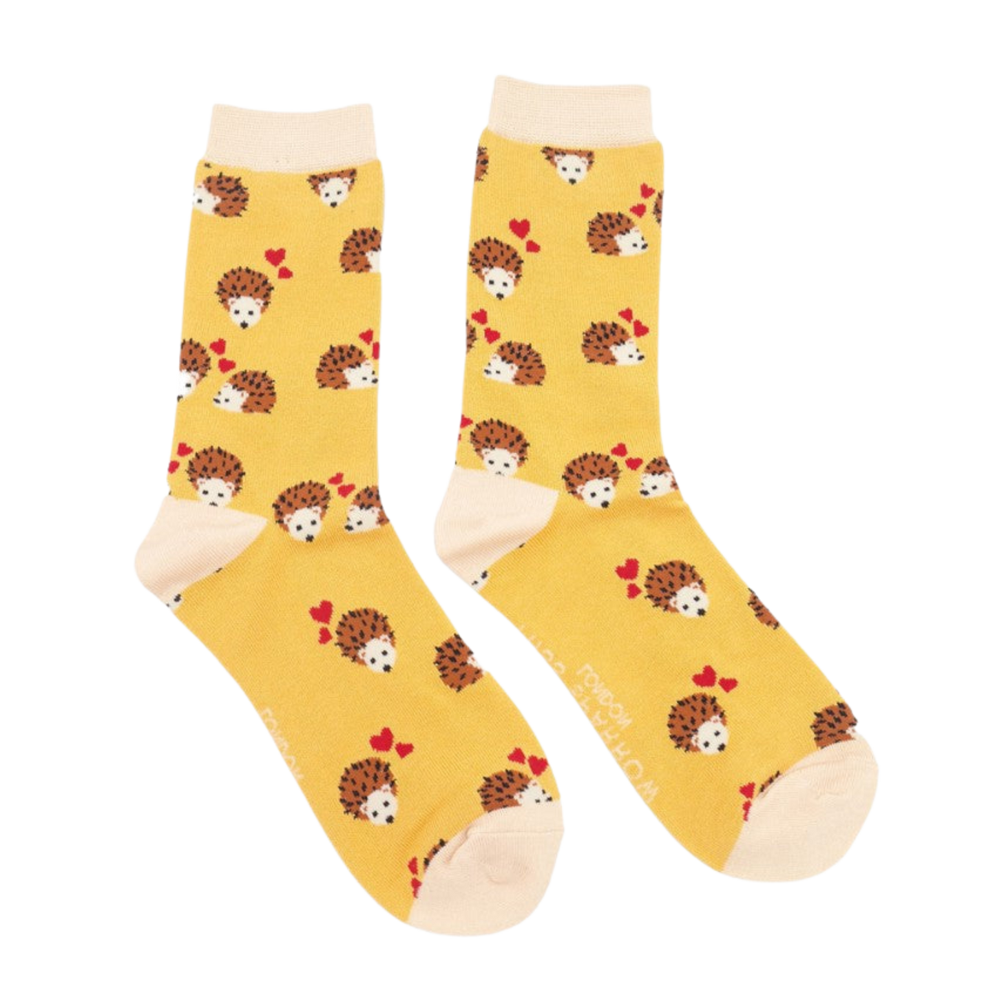 A pair of socks with a hedgehog and hearts motif. Yellow legs, pink heel, toe and cuff.