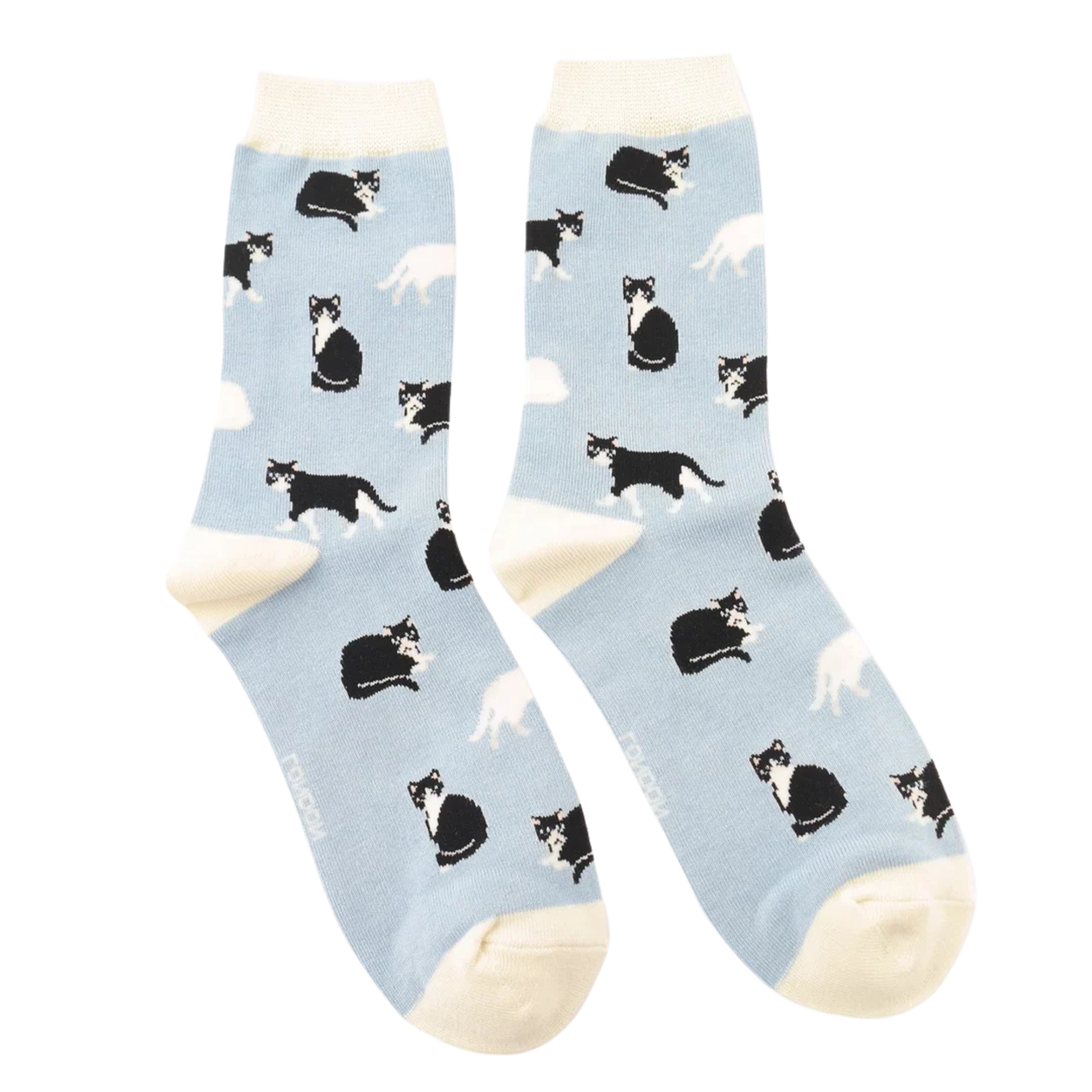 A pair of socks featuring black and white cats. Light blue legs, white heel, toe and cuff.