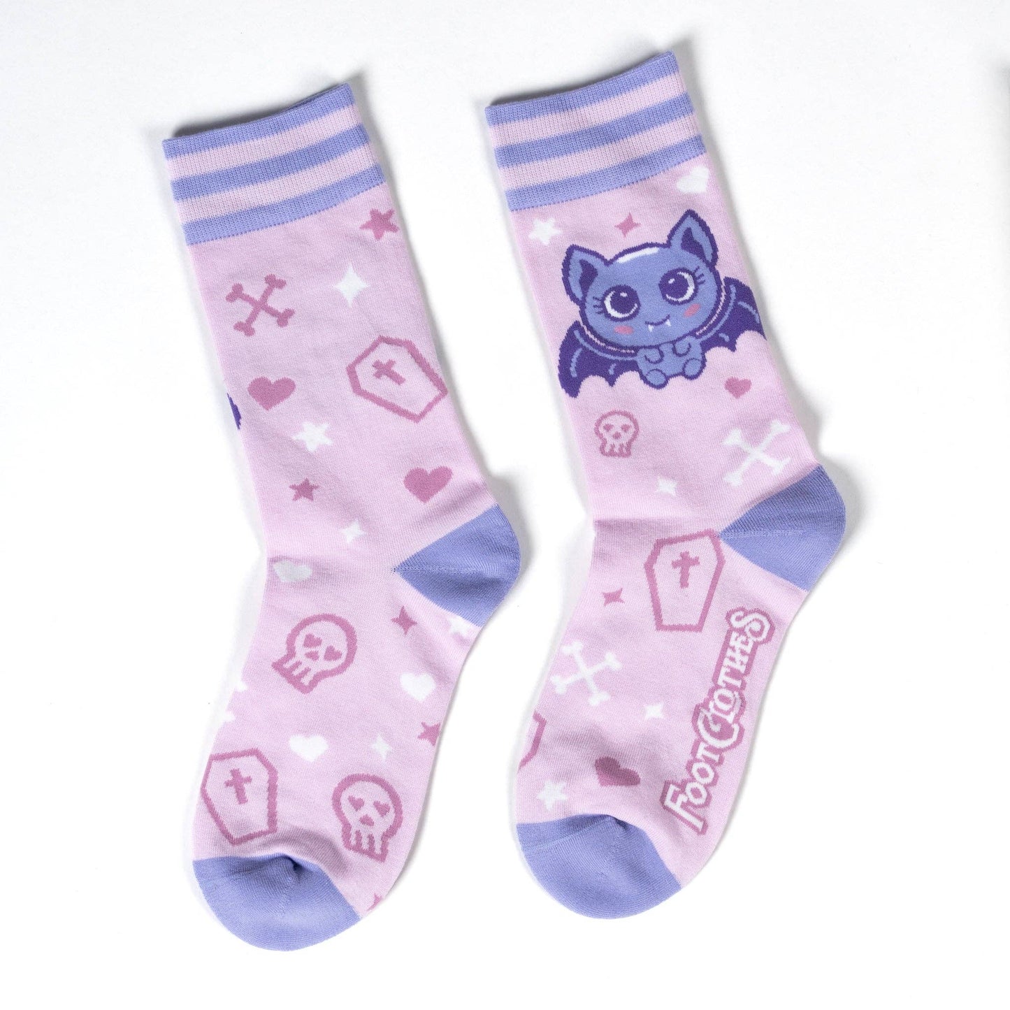 A pair of socks with a cute bat motif. Pink legs, light purple heel, toe and cuff.