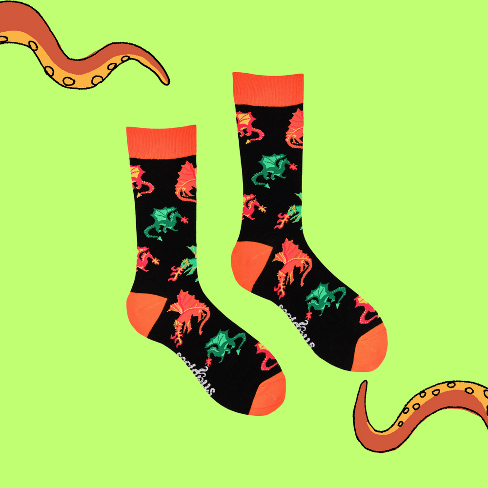 
                      
                        A pair of socks depicting fire breathing dragons. Black legs, orange cuff, heel and toe.
                      
                    