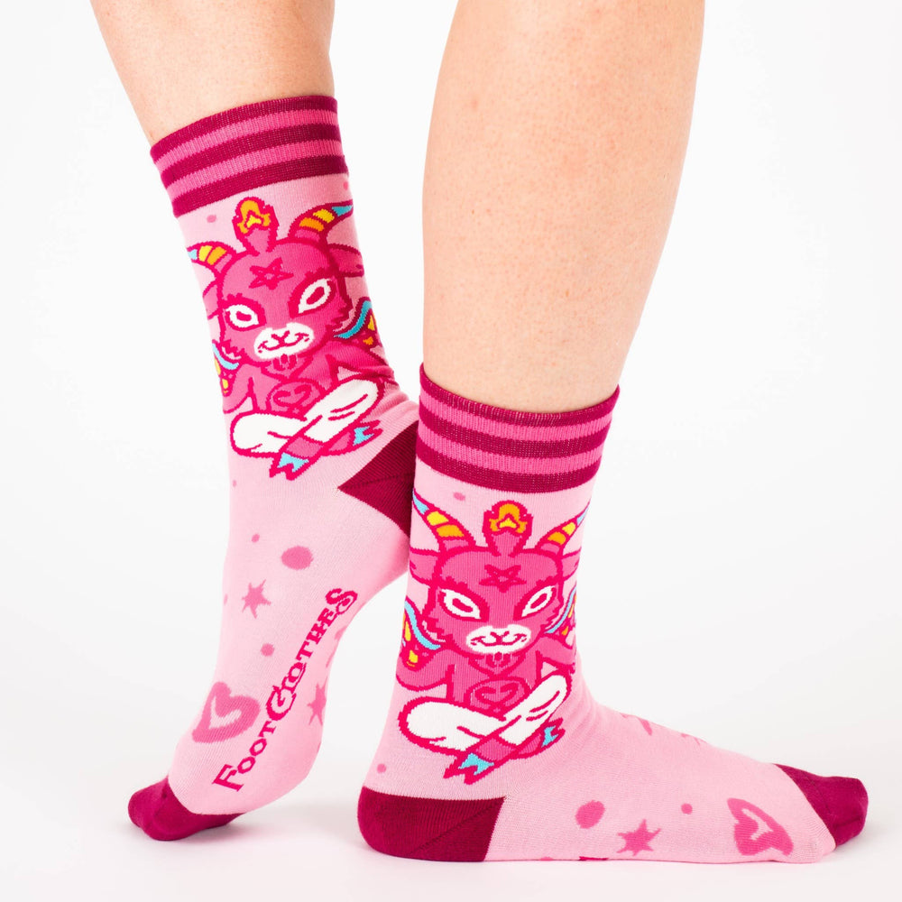 
                      
                        A pair of socks featuring a cute little devil. Pink legs, bright pink heel, toe and cuff. 
                      
                    