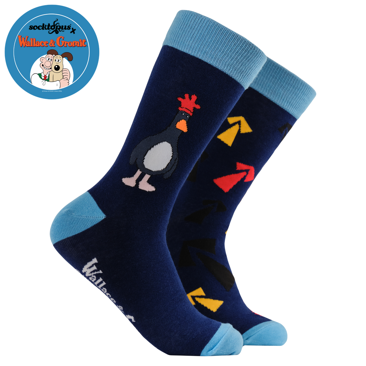 Navy blue socks with Wallace & Gromit themes on a white background.