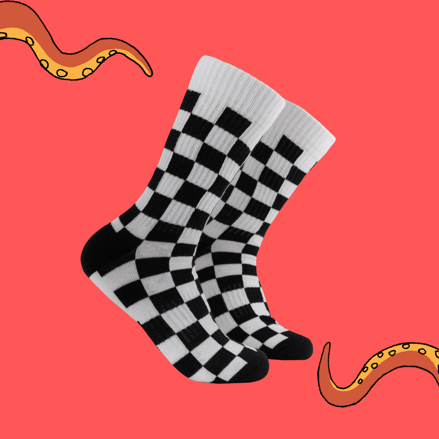 A pair of socks with a black and white checkered pattern. 
