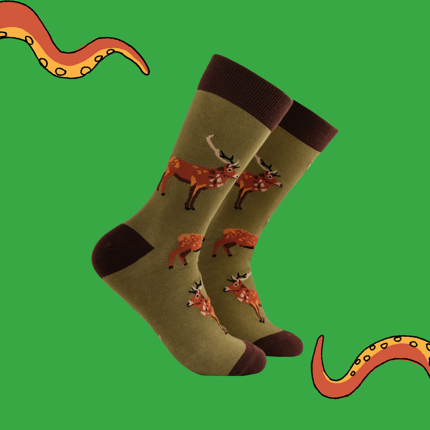 A pair of socks featuring a stag motif. Brown legs, heel, toe and cuff 