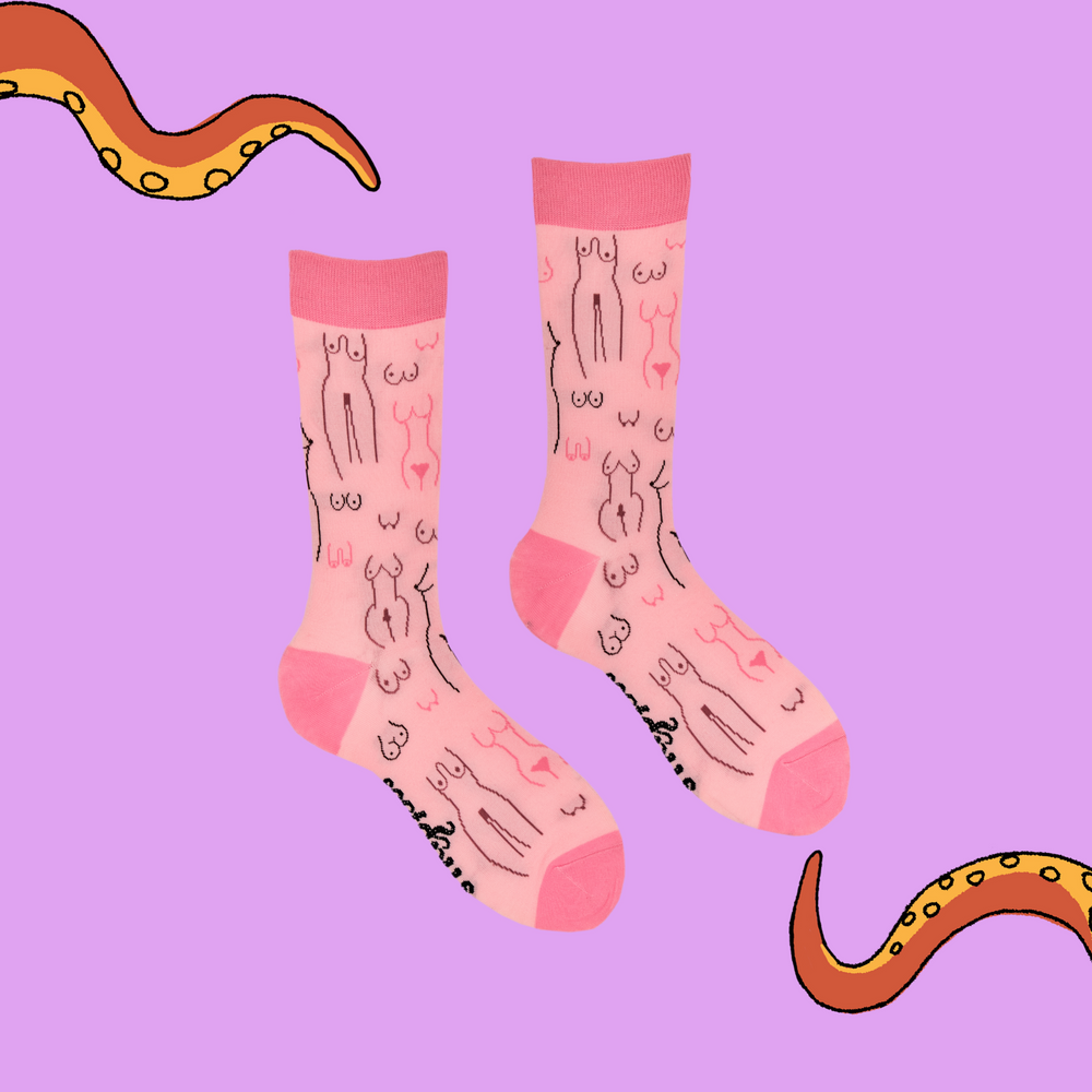 
                      
                        A pair of socks depicting tea cups and tea pots. Pink legs, dark pink cuff, heel and toe.
                      
                    