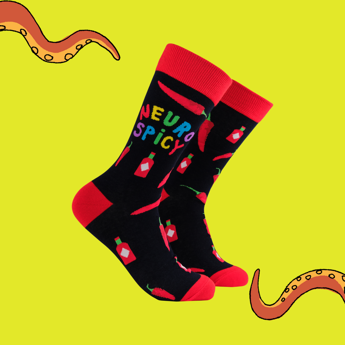 A pair of socks that celebrate your spicy brain. Black legs, red heel, toe and cuff. 