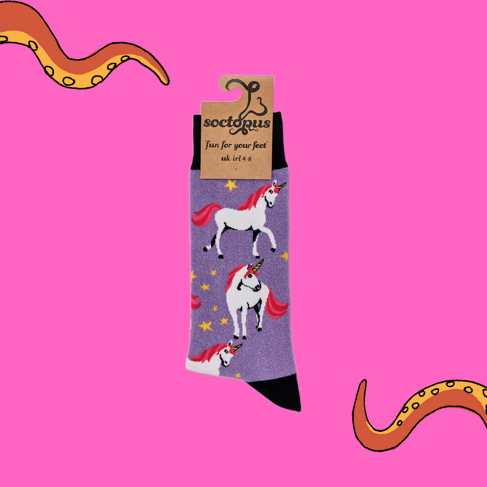 
                      
                        A pair of socks depicting unicorns. Glittery purple legs, black cuff, heel and toe. In Soctopus Packaging.
                      
                    