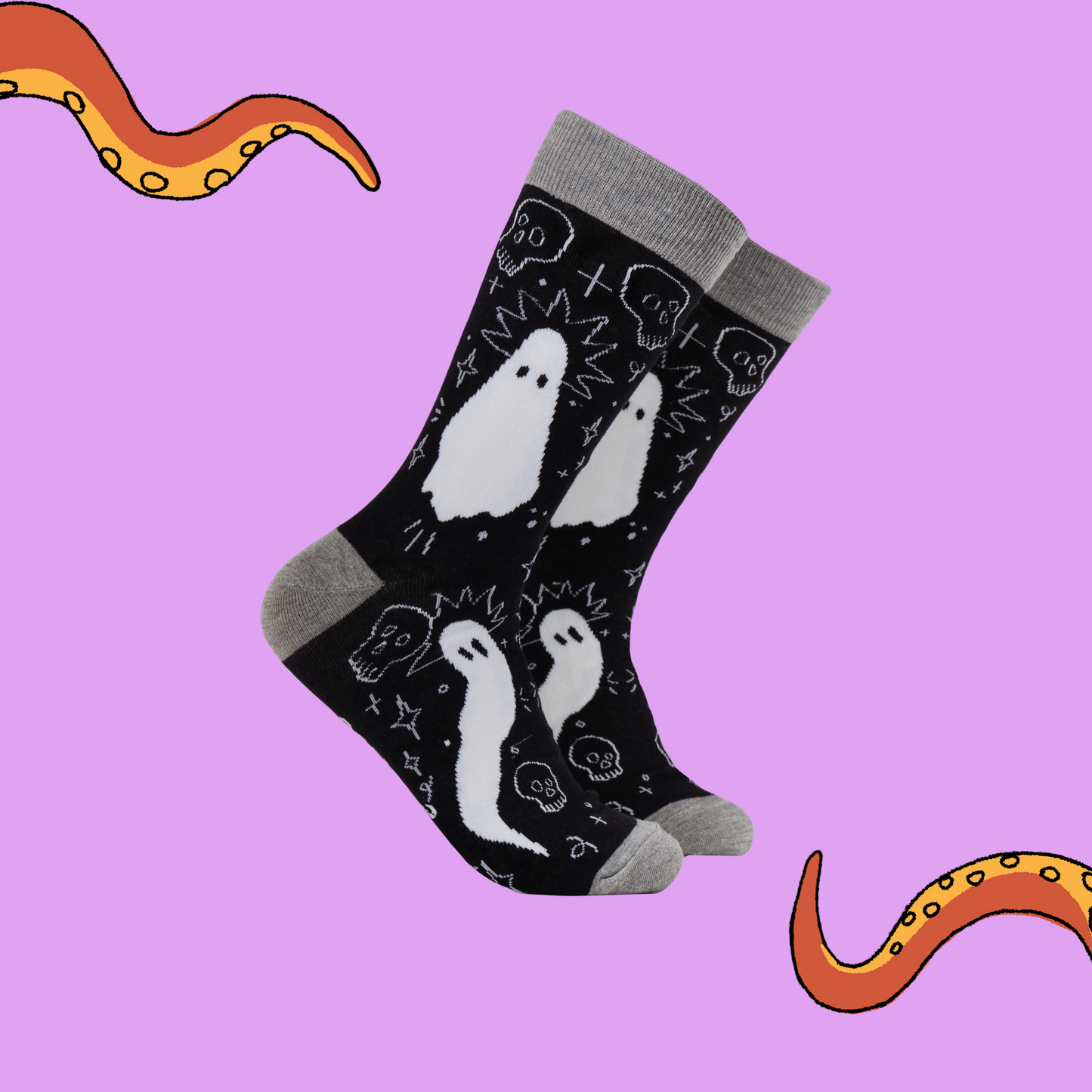 A pair of socks with a ghost motif. Black legs, grey heel, toe and cuff. 