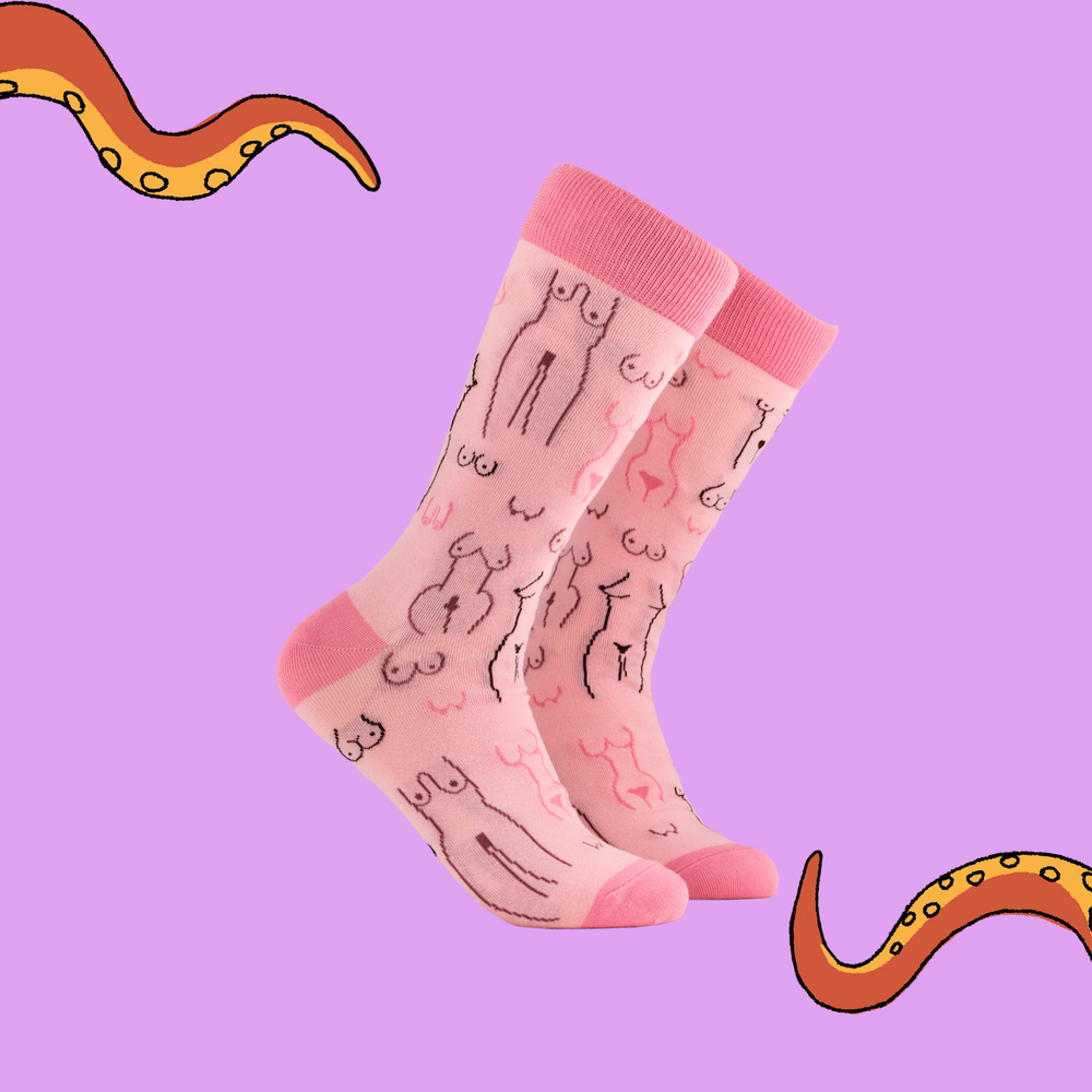 
                      
                        Boobs Socks. A pair of socks depicting tea cups and tea pots. Pink legs, dark pink cuff, heel and toe.
                      
                    