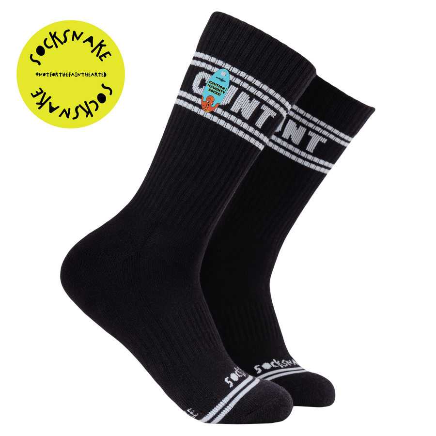 A black pair of athletic socks with white trim on the ankles and toes. A euphemism for the female genitals on the ankle.