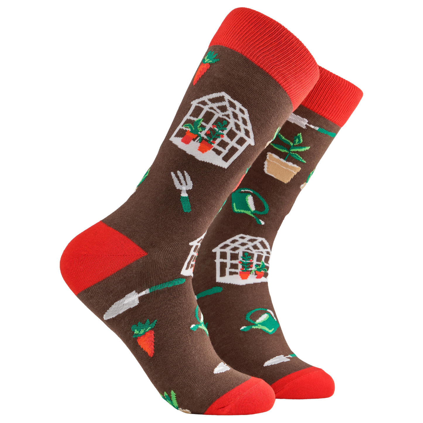 A pair of socks depicting garden tools and greenhouses. Brown legs, red cuff, heel and toe.