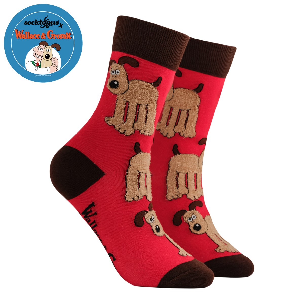 Red socks with brown dog illustrations on a white background
