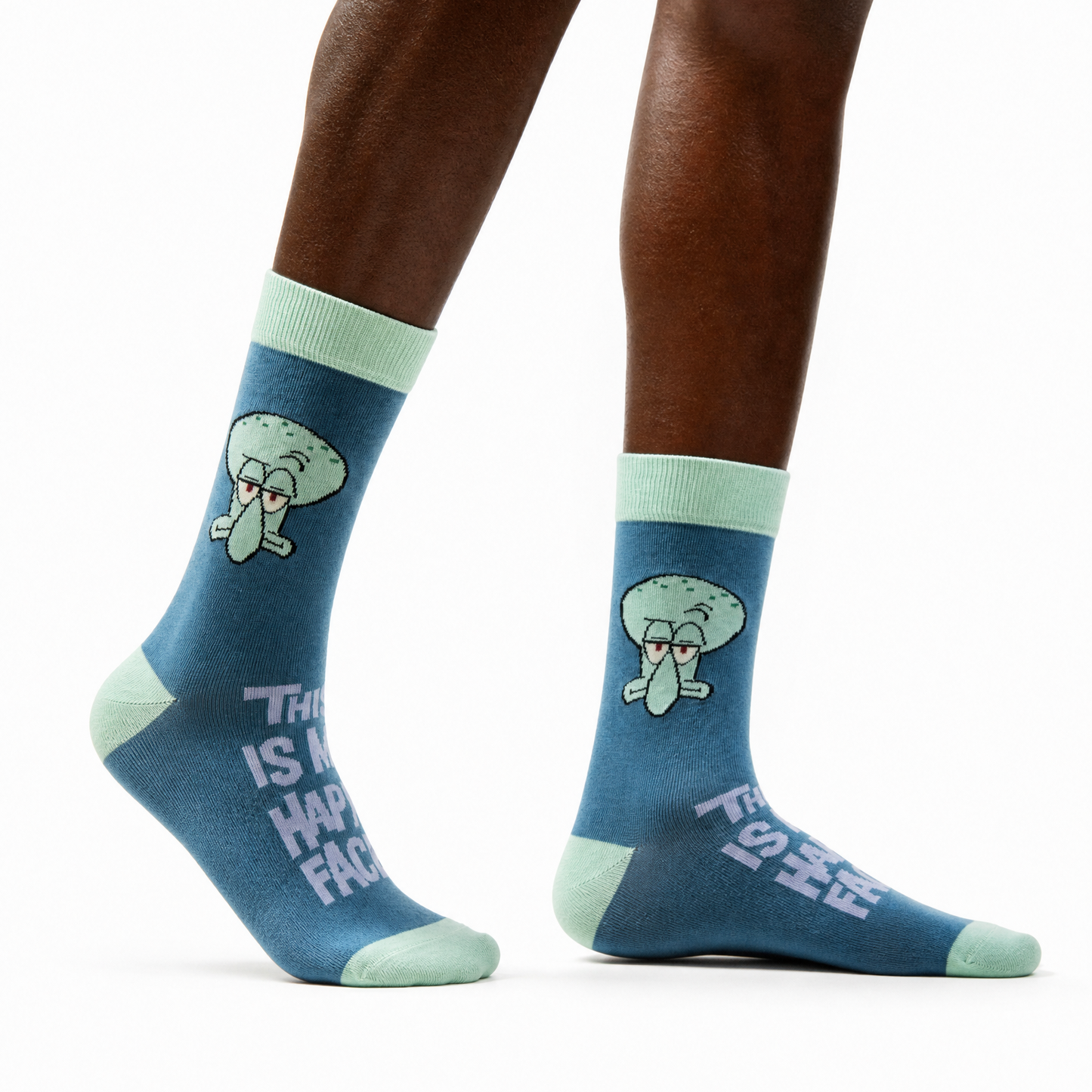 A person's legs wearing blue crew socks Squidward image shown against a plain white background.