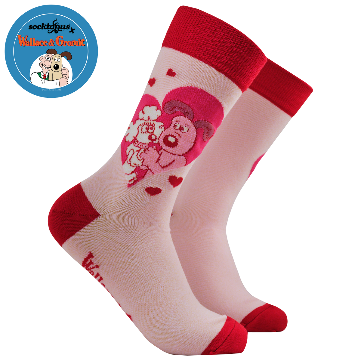 Pair of socks with cartoon design and red accents on a white background