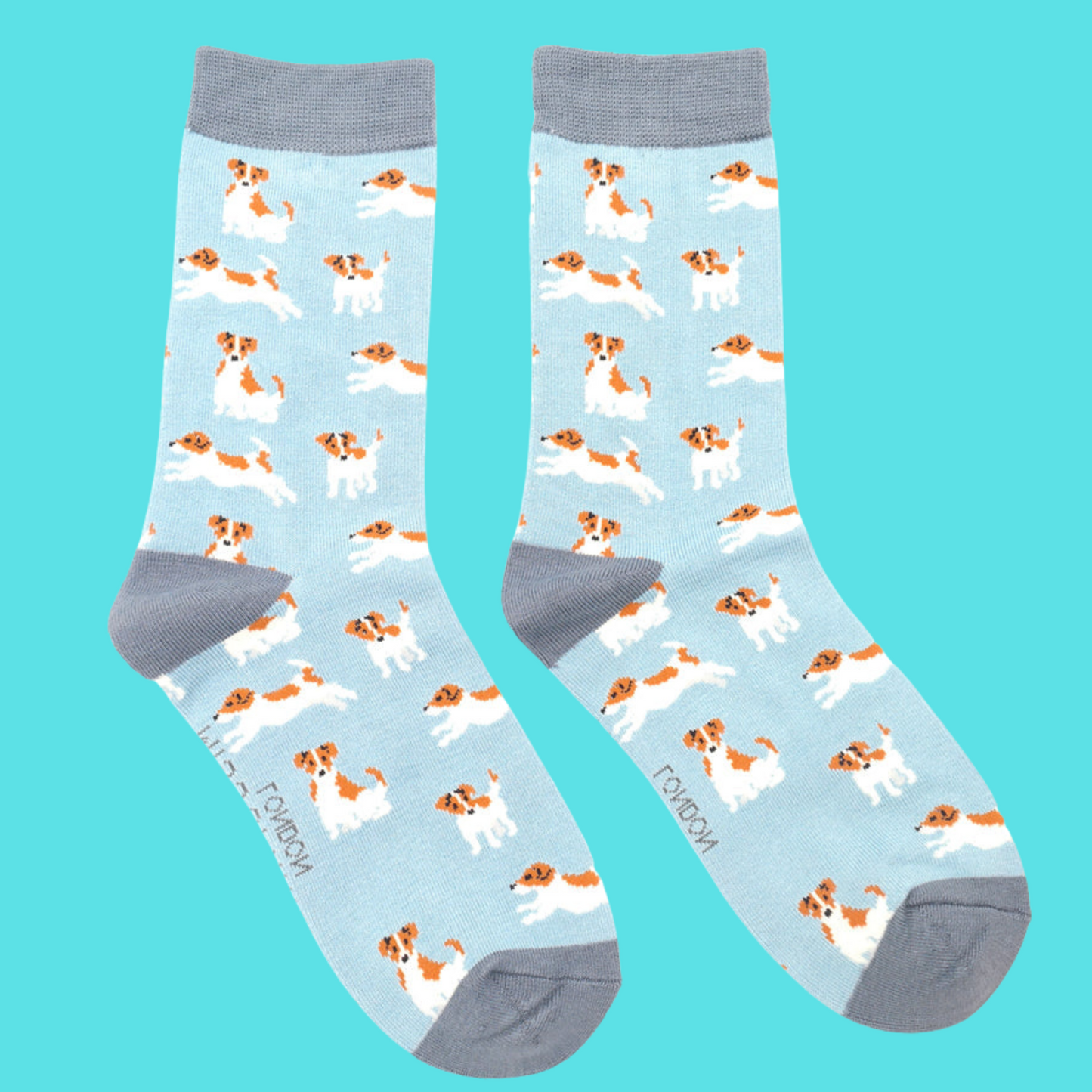 A pair of socks featuring a jack russell motif. Light blue legs, grey heel, toe and cuff. 