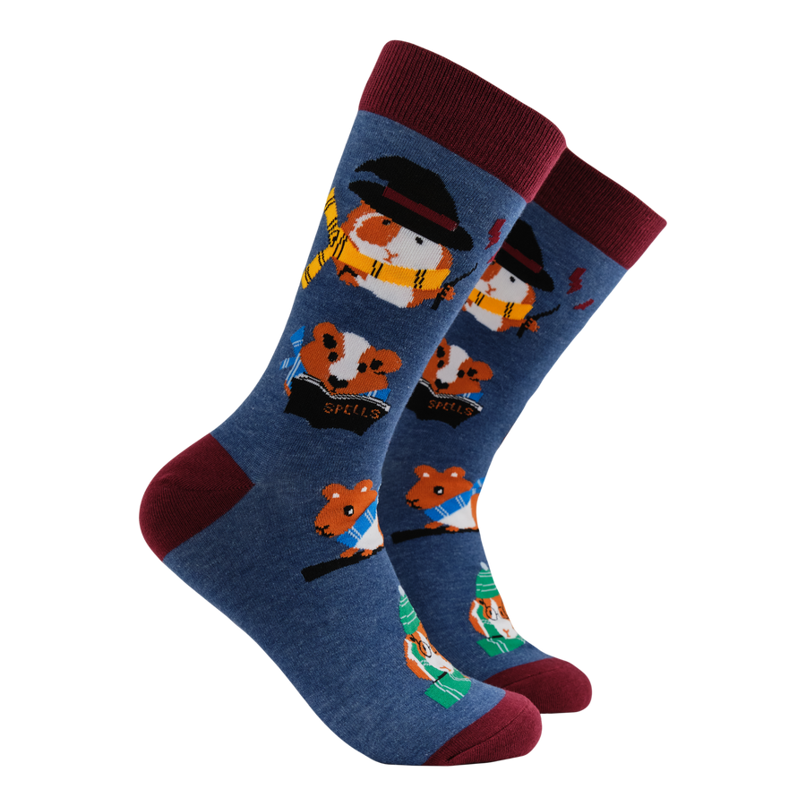 Guinea Pig Harry Potter Socks - Pigardium Leviosa. A pair of socks featuring magical piggies. Blue legs, brown heel, toe and cuff. 