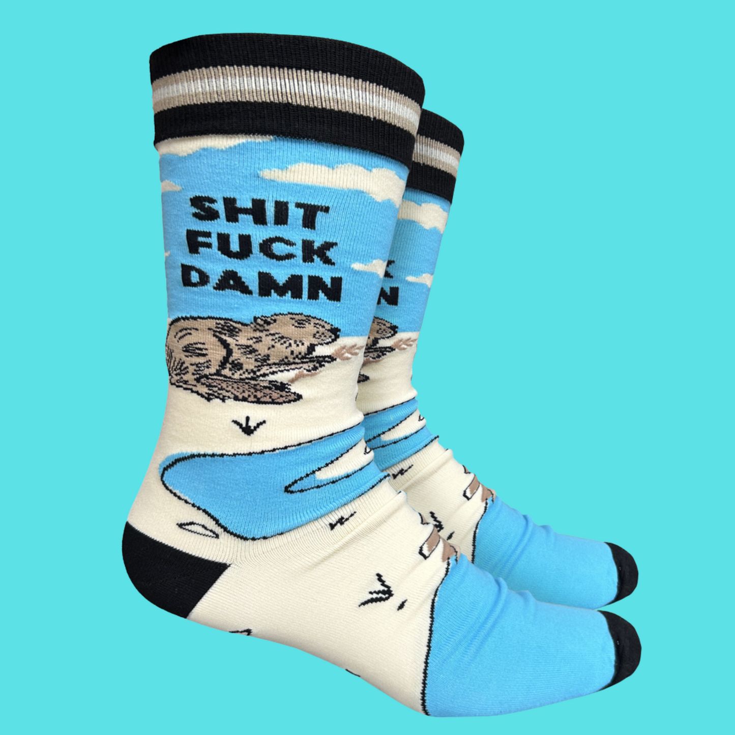 A apir of socks with a blod blue otter motif and a sweary slogan. Blue legs, black toes, cuff and heel.