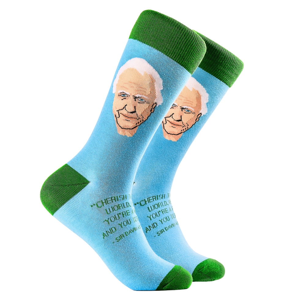 Sir David Attenborough Socks. A pair of socks depicting tSir David Attenborough Socks. Blue legs, green cuff, heel and toe.