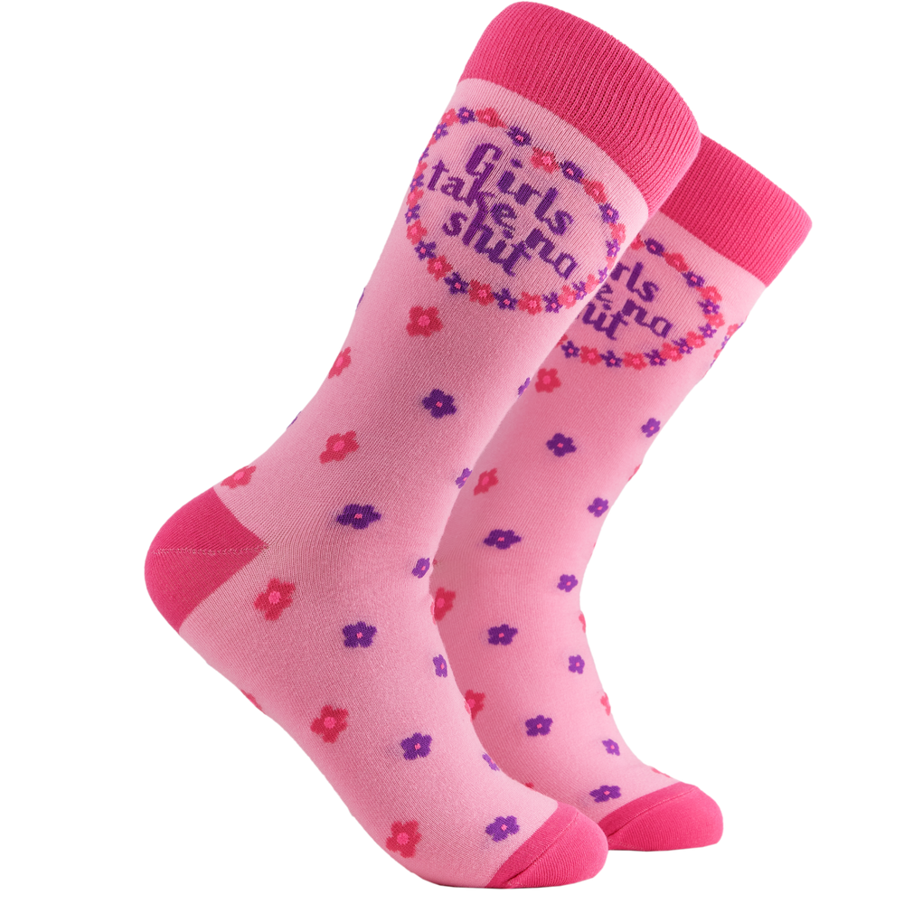Feminist Socks - Girls Take No Shit. A pair of socks depicting the words "Girls Tale No Shit". Pink legs, dark pink cuff, heel and toe