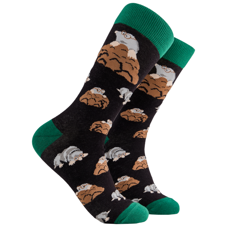 Mole Socks. A pair of socks depicting adorable moles digging. Black legs, green cuff, heel and toe.