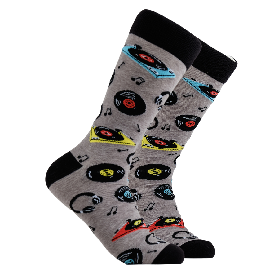 Vinyl Socks - Vinyl Lifer. A pair of socks vinyl records and record players. Grey legs, black cuff, heel and toe.