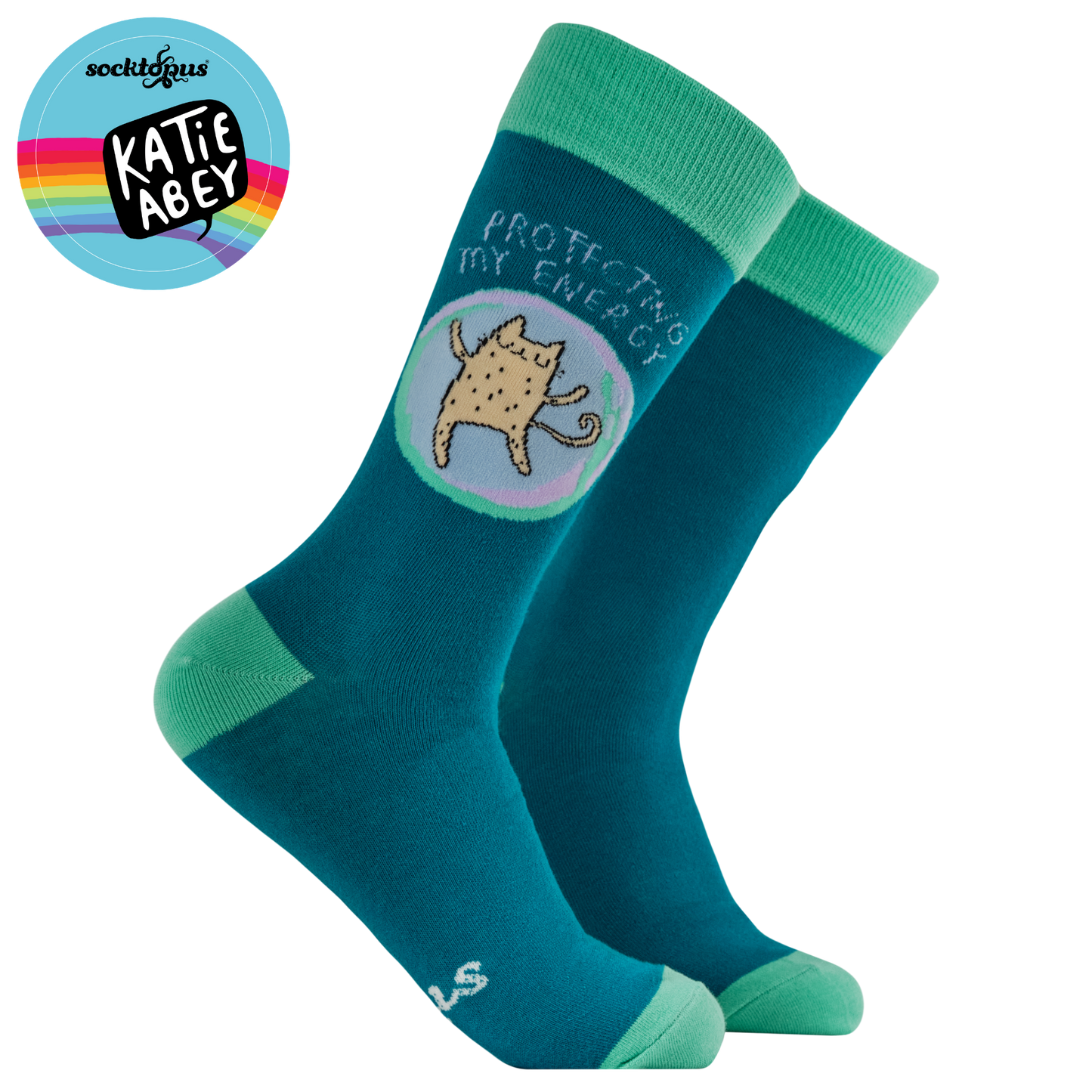 Teal socks with a cat illustration and text, featuring the brand 'Katie Abey'.