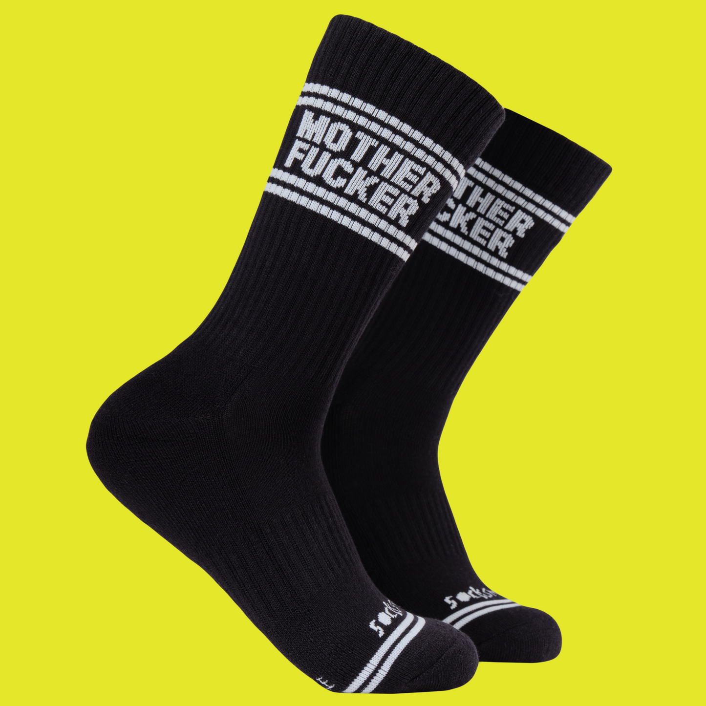 A black pair of athletic socks with white trim on the ankles and toes. With a very rude insult involving mothers on the ankle.