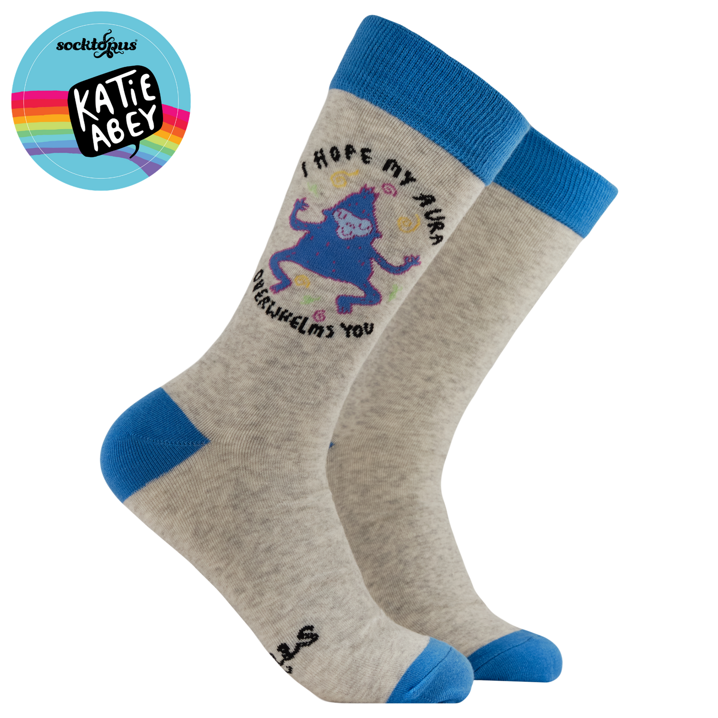 Gray socks with blue accents and a cartoon character, featuring the brand 'Katie Abey'.