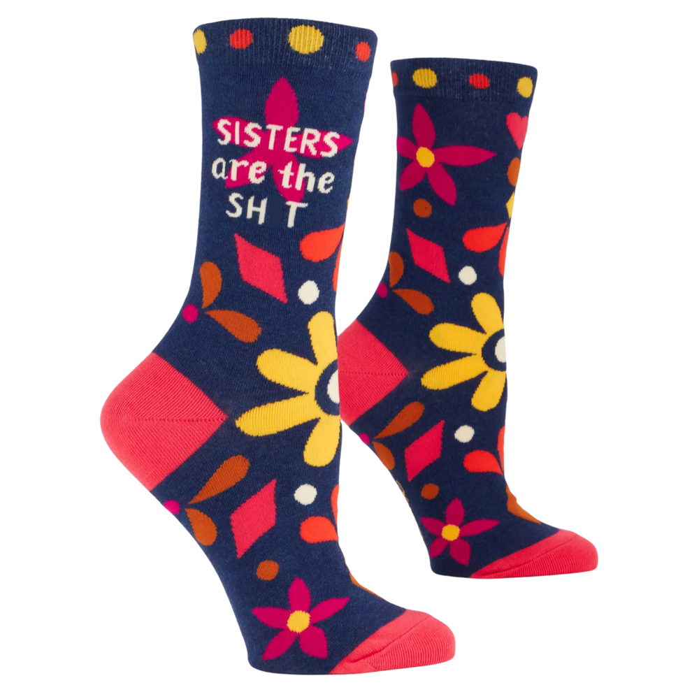 Sisters Are The S**t Socks. A pair of socks with a floral motif and a sweary sister slogan. 