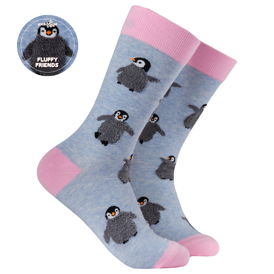 Gray socks with penguin pattern and pink accents, featuring 'Fluffy Friends' logo.