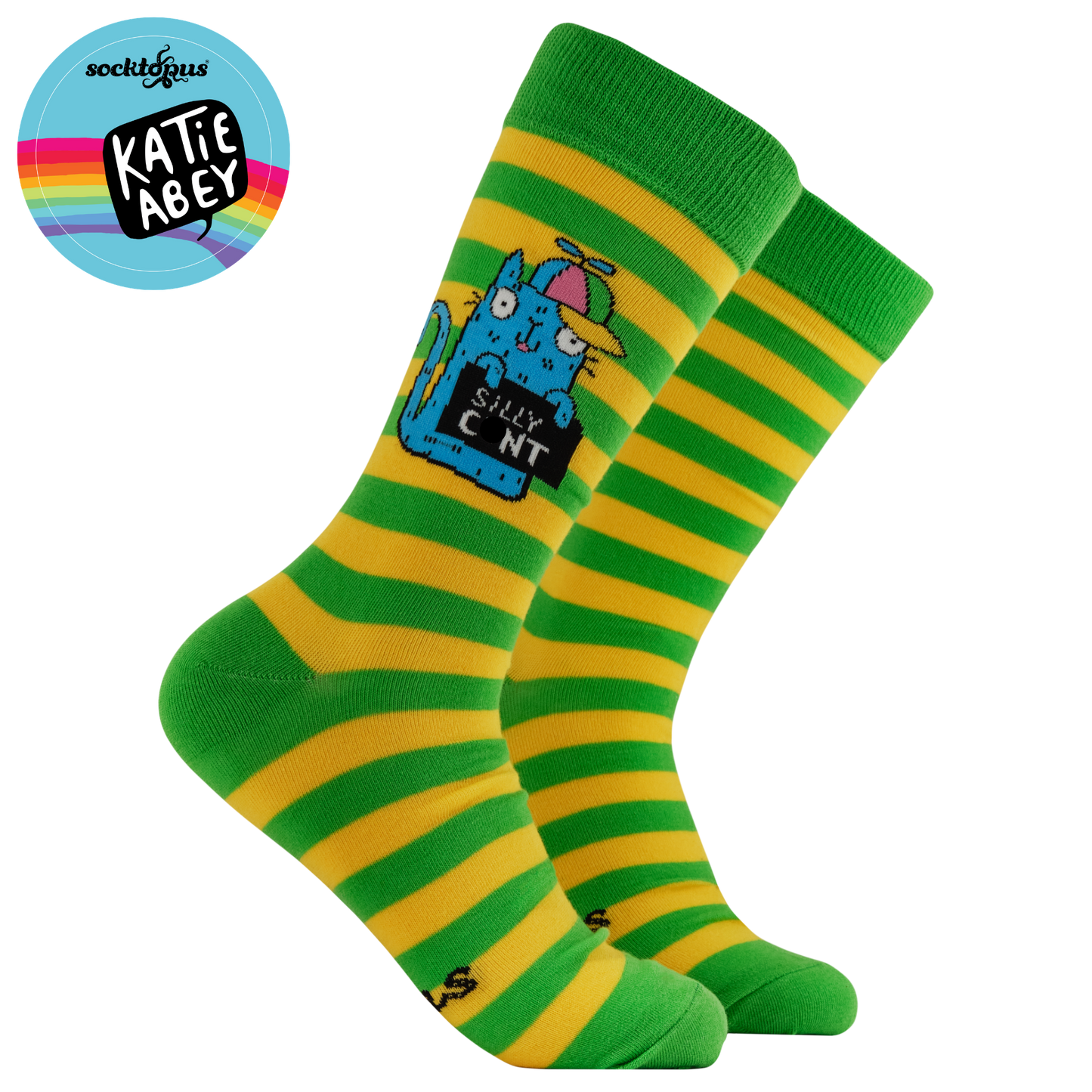 Green and yellow striped socks with a cartoon character and text, branded with Katie Abey.