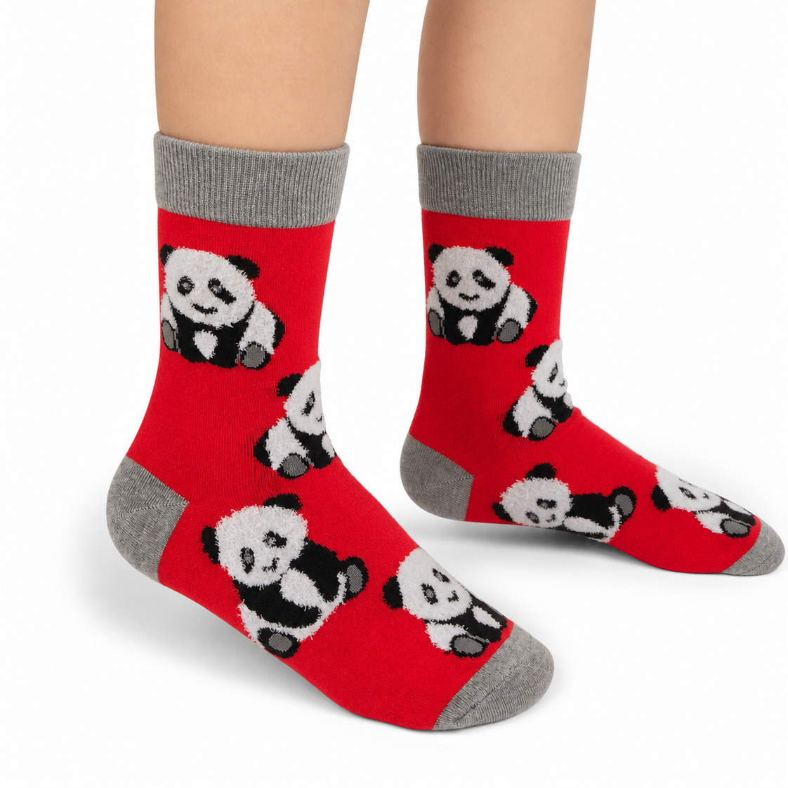Red crew socks with a black and white panda pattern, shown on a child's feet against a white background.