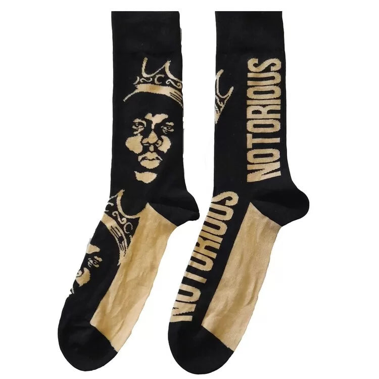The Notorious B.I.G. Gold Crown Socks. A pair of socks featuring Biggie wearing a gold crown. Black and gold legs, toe, heel and cuff. 